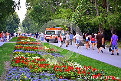 Ambulance at colorful park alley Editorial Stock Photo