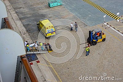 An ambulance on a cruise ship dock in Aruba waiting to take a cruise ship passenger to the hospital for a medical emergency Editorial Stock Photo