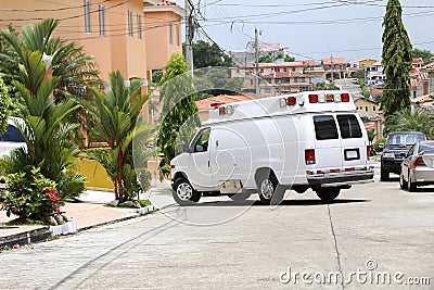 Ambulance entering to a house Stock Photo