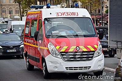 Ambulance of the French fire service rushing into scene in Paris France Editorial Stock Photo