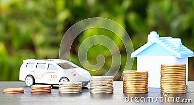 Ambulance and house on coin on background. Stock Photo