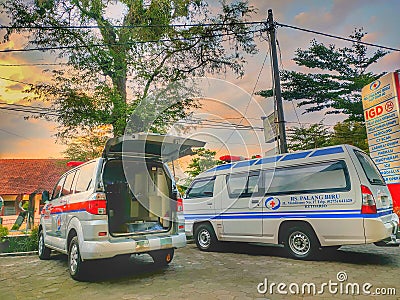 Ambulance parked in front of the hospital Editorial Stock Photo