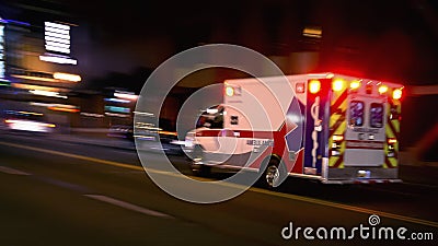 Fast speeding ambulance Stock Photo