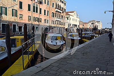 Ambulance station with boats used instead of ambulances located on a canal in Venice Editorial Stock Photo
