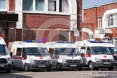 Ambulance station. An increased fleet of cars during the aggravation of the situation with the coronavirus. Saint Editorial Stock Photo