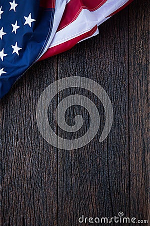 America flag waving pattern on wooden background in table top view, red blue white strip concept for USA 4th july independence day Stock Photo