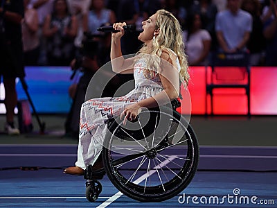 American actress and singer Ali Stroker performs the National Anthem on Opening Night at the 2019 US Open Editorial Stock Photo