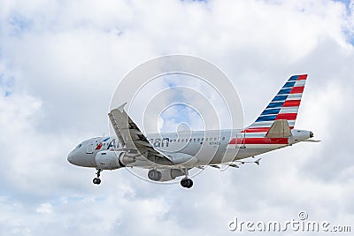 American Airlines aircraft Airbus 319 N714US preparing to land at SXM Editorial Stock Photo