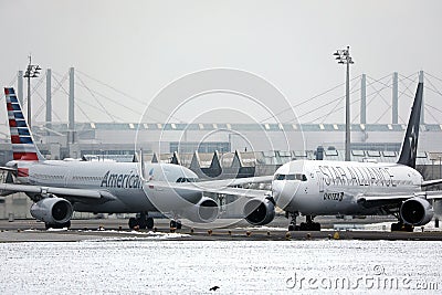 American Airlines plane and United Star Alliance in Munich Airport, MUC Editorial Stock Photo