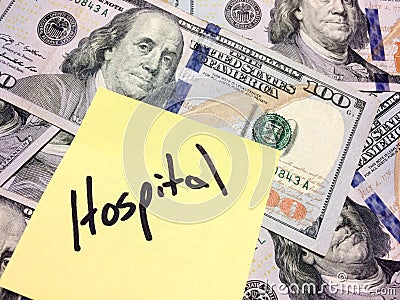 American cash money and yellow paper note with text Hospital Stock Photo