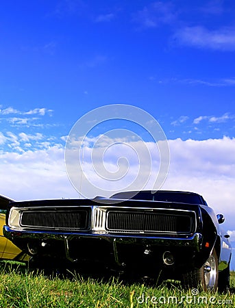 American Classic Car - Black Muscle on Grass Stock Photo