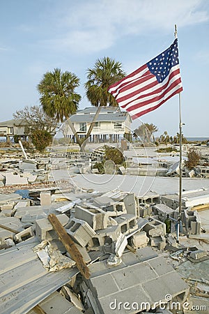 American Flag and destroyed house Editorial Stock Photo