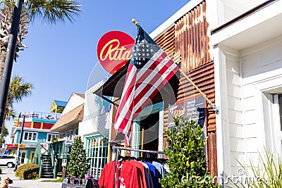 American flag hanging outside a restaurant with corrugated metal walls Editorial Stock Photo