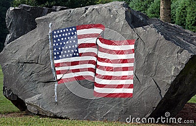 American Flag painted on a boulder Stock Photo