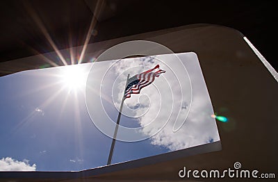 American Flag viewed from the USS Arizona Memorial Stock Photo