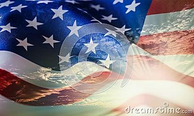 American flag waving in the wind at sunset or sunrise Stock Photo