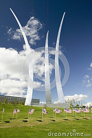 American flags at base of three soaring spires of the Air Force Memorial at One Air Force Memorial Drive, Arlington, Virginia in Stock Photo