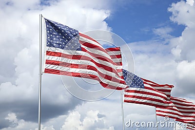 American flags of a memorial for veterans flying in the breeze Stock Photo