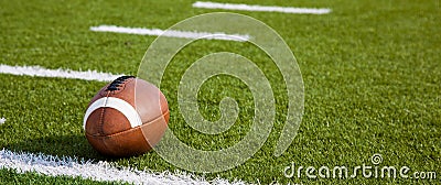 An American football on field Stock Photo