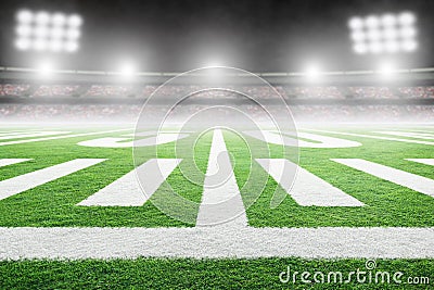 American Football Field With Stadium Lights and Copy Space Stock Photo