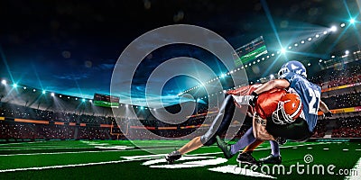 American football player in action on stadium Stock Photo
