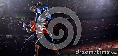 American football player in action on stadium Stock Photo