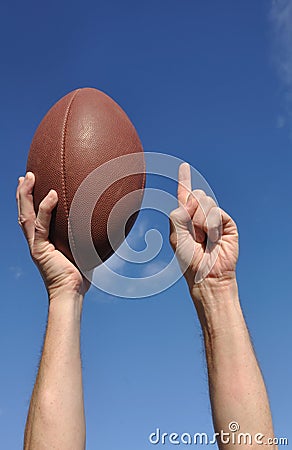 American Football Player Celebrates a Touchdown Stock Photo