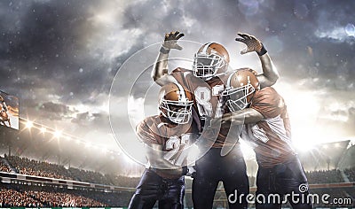 American football players in action on stadium Stock Photo