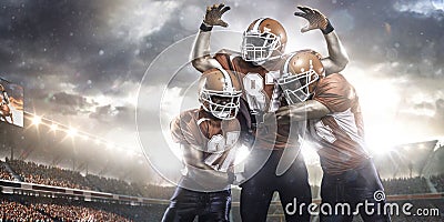 American football players in action on stadium Stock Photo