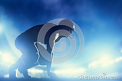 American football players in game. Stadium lights Stock Photo