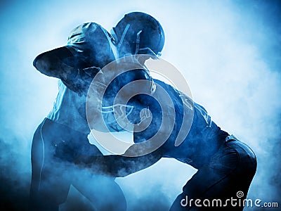 American football players silhouette Stock Photo