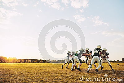 American football team doing defensive drills during a practice Stock Photo