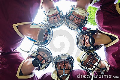 American Football Team having huddle in match Stock Photo