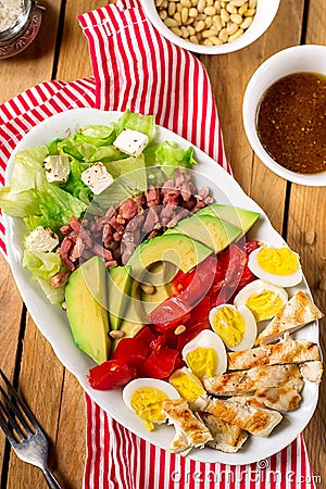 American garden salad Cobb salad with fresh vegetables and chick Stock Photo