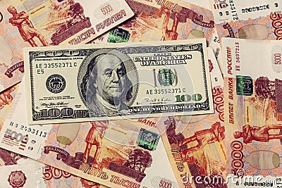 American hundred dollars on the background of Russian 5000 rubles Stock Photo