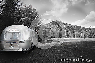 American iconic travel trailer parked in great outdoors Editorial Stock Photo