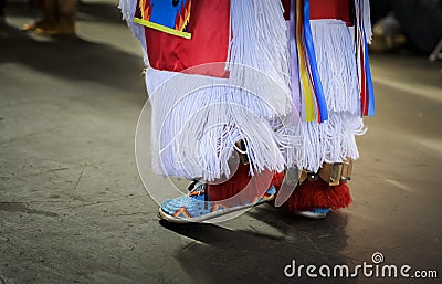 American Indian dancers in handmade beaded leather moccasins decorated with jingle bells at a powwow in San Francisco Stock Photo