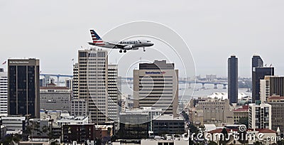 An American Jet on Approach Over Downtown San Diego Editorial Stock Photo