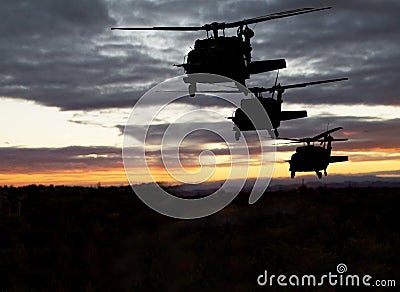 American Military Helicopters Night Flight Stock Photo