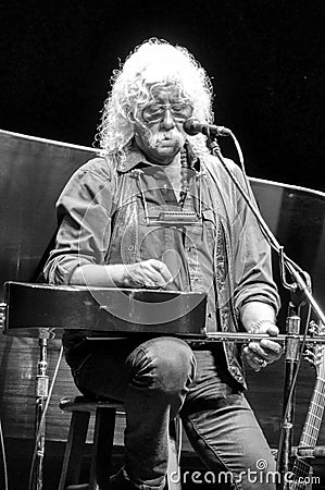 American Music Legend Arlo Guthrie impromptu photo with guitar Editorial Stock Photo