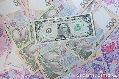 American one dollar banknote and ukrainian hryvnas. Corruption in Ukraine. Money background. Stock Photo