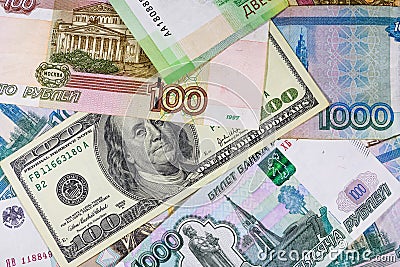 American one hundred dollars banknote on the many russian rubles Stock Photo