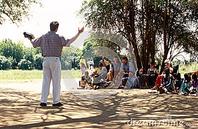 An American preacher in a Karamojong village Editorial Stock Photo