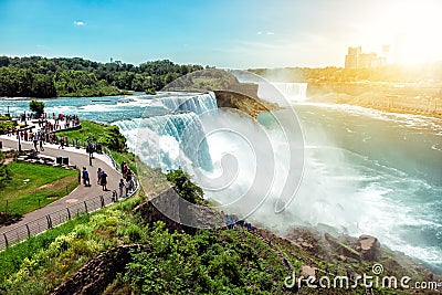 American side of Niagara falls, NY, USA. Tourists enjoying beautiful view to Niagara Falls during hot sunny summer day Stock Photo