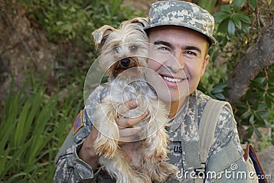 American soldier being welcomed by his dog Stock Photo