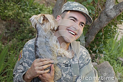 American soldier being welcomed by his dog Stock Photo