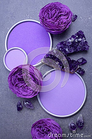 Amethyst crystals and roses with a round frame with a place Stock Photo