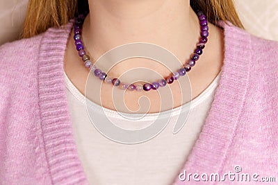 Necklace with lavender amethyst. Handmade jewelry. Selective focus Stock Photo