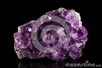 Amethyst mineral stone, black background Stock Photo