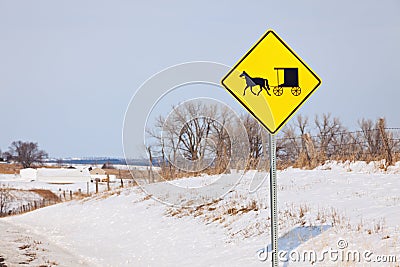 Amish carriage on the road sign Stock Photo